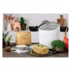 Pekač hljeba Gorenje, bijeli, okružen pečenim hljebom