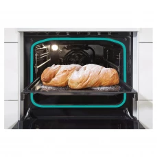 Električni štednjak sa ravnom pločom i programom za odleđavanje hrane.